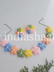 multicolored floral necklace and earrings in pastel colors