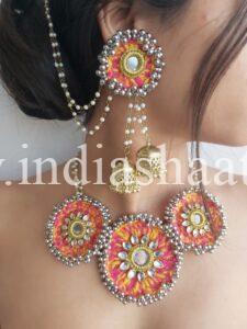 yellow and pink bridal necklace and earrings for haldi